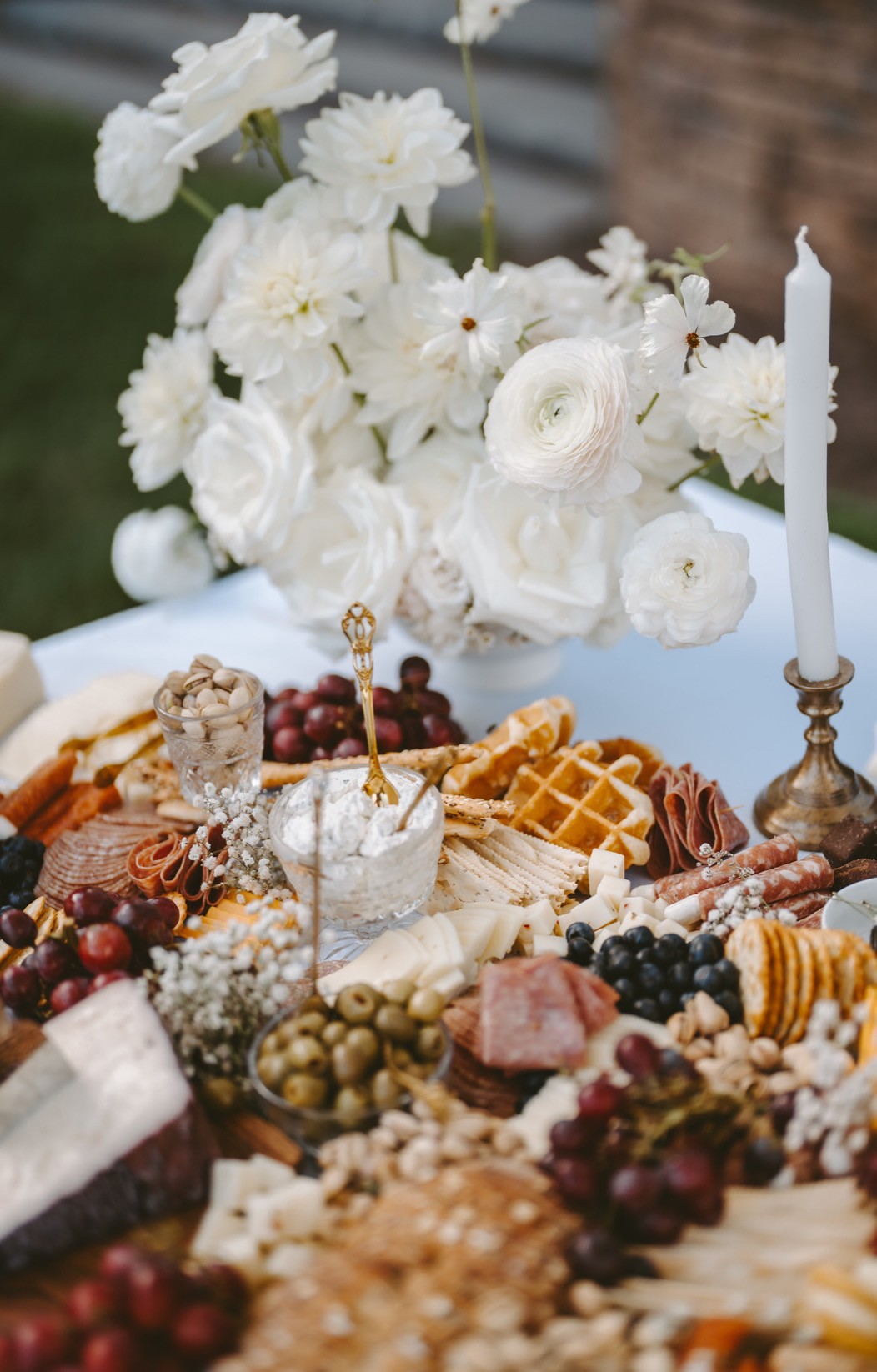 Grazing table close up with florals